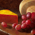 Cheese Wedge and Grapes
